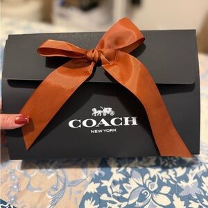 Coach Soho 25 Cream Leather Clutch with Gold Buckle